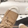 Chanel Brown Suede Low-Top Shoe with Cap-Toe & CC Chain Detail