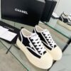 sy_no_04935DB51745B47700A8AB87CE51B4AF_4 Chanel Black and White Canvas Platform Low-Top Sneaker with Ribbed Sole and CC Logo