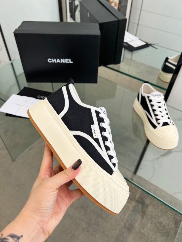 sy_no_04935DB51745B47700A8AB87CE51B4AF_6 Chanel Black and White Canvas Platform Low-Top Sneaker with Ribbed Sole and CC Logo