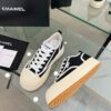 sy_no_04935DB51745B47700A8AB87CE51B4AF_8 Chanel Black and White Canvas Platform Low-Top Sneaker with Ribbed Sole and CC Logo