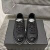 sy_no_04BADAF1334E37663532CBFFE5BFB4F0_0 Chanel Black Leather Low-Top Sneaker with Patent Cap-Toe