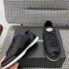 sy_no_04BADAF1334E37663532CBFFE5BFB4F0_2 Chanel Black Leather Low-Top Sneaker with Patent Cap-Toe