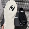 sy_no_04BADAF1334E37663532CBFFE5BFB4F0_8 Chanel Black Leather Low-Top Sneaker with Patent Cap-Toe