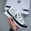 sy_no_0958598B684D7CD1E215E40C8890385B_0 Chanel White-Black Mixed-Material Low-Top Sneaker with Suede and CC Logo