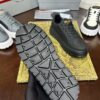 Prada Black Mesh Gold-Trim Triangle Tread Platform Sneaker