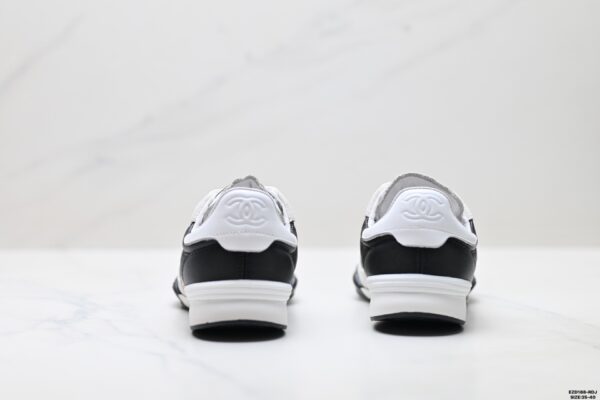 sy_no_0C950A3BD7017281AD1B51390064F5FC_5 Chanel Black and White Quilted Leather Low-Top Sneaker with Suede Cap-Toe and CC Logo