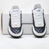sy_no_0C950A3BD7017281AD1B51390064F5FC_6 Chanel Black and White Quilted Leather Low-Top Sneaker with Suede Cap-Toe and CC Logo