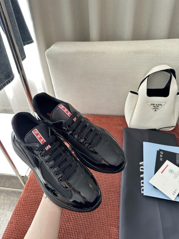 sy_no_0F83A49262B2D1F03078243D417D72E9_1 Prada Black Patent Mesh Red Label Sneaker