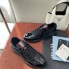 sy_no_0F83A49262B2D1F03078243D417D72E9_3 Prada Black Patent Mesh Red Label Sneaker