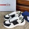 sy_no_10BE1484FA39D03407E0AA139E9EA24F_1 Prada Black White Leather Triangle Chunky Sneaker