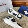 sy_no_10BE1484FA39D03407E0AA139E9EA24F_2 Prada Black White Leather Triangle Chunky Sneaker