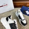 sy_no_10BE1484FA39D03407E0AA139E9EA24F_4 Prada Black White Leather Triangle Chunky Sneaker