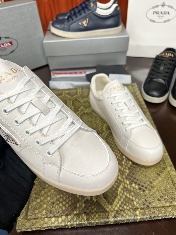 sy_no_136711FF87369E866713A53F55BA6C5C_2 Prada Off-White Leather Metal-Triangle Vulcanized-Sole Sneaker