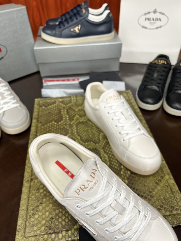 sy_no_136711FF87369E866713A53F55BA6C5C_4 Prada Off-White Leather Metal-Triangle Vulcanized-Sole Sneaker
