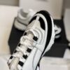 sy_no_1629F2D60DE02E8BE6ED73BFF8A99919_2 Chanel White and Black Leather Low-Top Sneaker with Suede Toe Cap and CC Logo