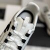 sy_no_1629F2D60DE02E8BE6ED73BFF8A99919_4 Chanel White and Black Leather Low-Top Sneaker with Suede Toe Cap and CC Logo