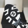 sy_no_1629F2D60DE02E8BE6ED73BFF8A99919_7 Chanel White and Black Leather Low-Top Sneaker with Suede Toe Cap and CC Logo