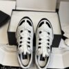 sy_no_1629F2D60DE02E8BE6ED73BFF8A99919_8 Chanel White and Black Leather Low-Top Sneaker with Suede Toe Cap and CC Logo