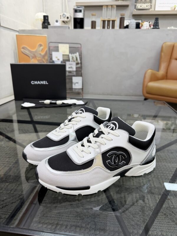 sy_no_19EA28E5ED17DC15AF2BD7D9A110A364_0 Chanel Black & White Chunky Sneaker with Interlocking CC Logo