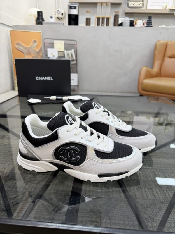 sy_no_19EA28E5ED17DC15AF2BD7D9A110A364_1 Chanel Black & White Chunky Sneaker with Interlocking CC Logo
