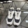 sy_no_19EA28E5ED17DC15AF2BD7D9A110A364_2 Chanel Black & White Chunky Sneaker with Interlocking CC Logo