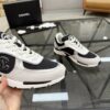 sy_no_19EA28E5ED17DC15AF2BD7D9A110A364_5 Chanel Black & White Chunky Sneaker with Interlocking CC Logo