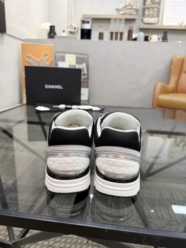 sy_no_19EA28E5ED17DC15AF2BD7D9A110A364_7 Chanel Black & White Chunky Sneaker with Interlocking CC Logo