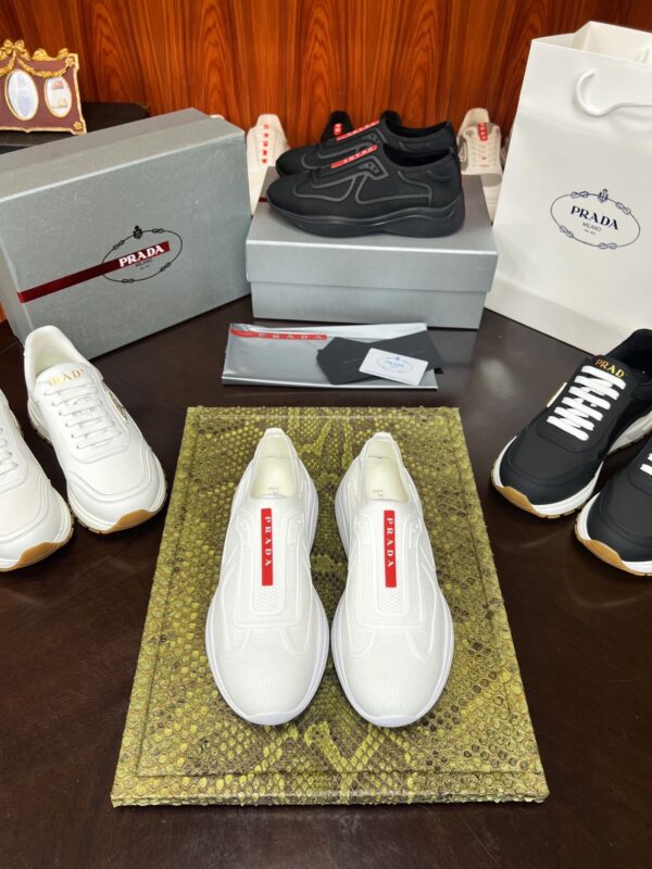 sy_no_1B84C9C09155AA6C55D2D01F890151C3_0 Prada White Knit Red-Label Slip-On Platform Sneaker
