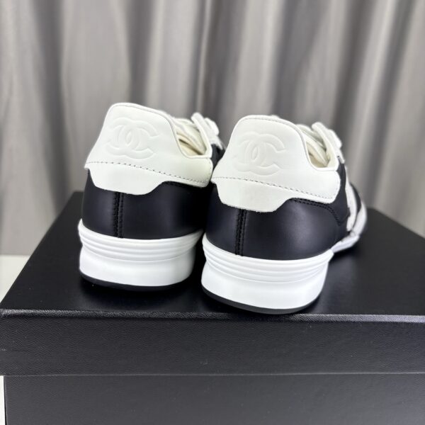 Chanel Quilted Calfskin & Suede Retro Trainer Black-White-Quilted-Calfskin