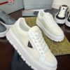 sy_no_1C40D928BAA547468CABBF707EBDF449_1 Prada Off-White Mesh Metal-Triangle Tread Platform Sneaker