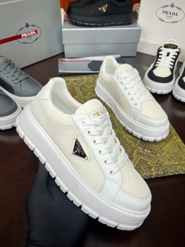 sy_no_1C40D928BAA547468CABBF707EBDF449_1 Prada Off-White Mesh Metal-Triangle Tread Platform Sneaker