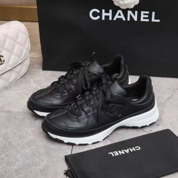 sy_no_1D482E6308BEACE629766C721B814D19_1 Chanel All-Black Leather Low-Top Sneaker with Tonal CC Logo and White Midsole