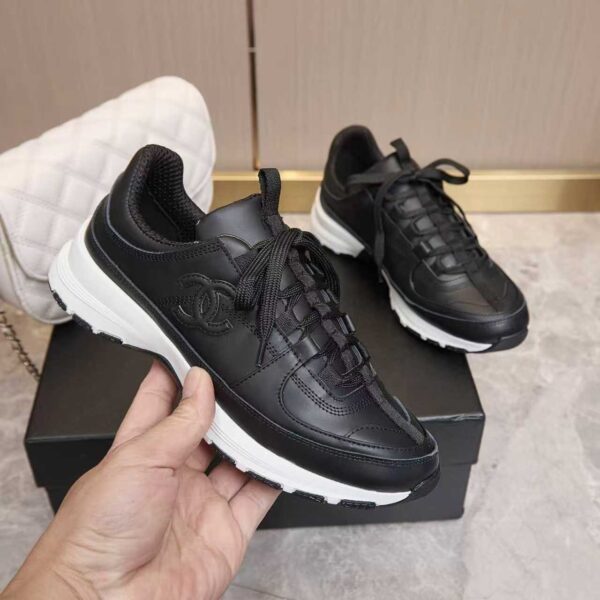 sy_no_1D482E6308BEACE629766C721B814D19_2 Chanel All-Black Leather Low-Top Sneaker with Tonal CC Logo and White Midsole