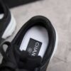 sy_no_1D482E6308BEACE629766C721B814D19_6 Chanel All-Black Leather Low-Top Sneaker with Tonal CC Logo and White Midsole
