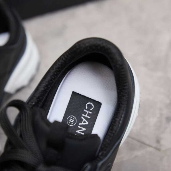 sy_no_1D482E6308BEACE629766C721B814D19_6 Chanel All-Black Leather Low-Top Sneaker with Tonal CC Logo and White Midsole