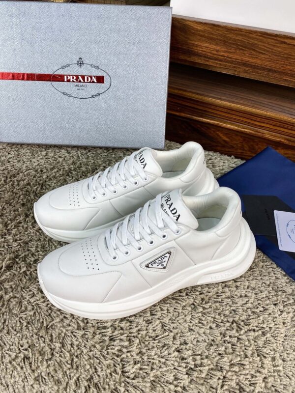 sy_no_20E0A942F8BDD7AF7176394FD51BF0D1_1 Prada White Leather Triangle Logo Thick-Sole Low-Top Sneaker