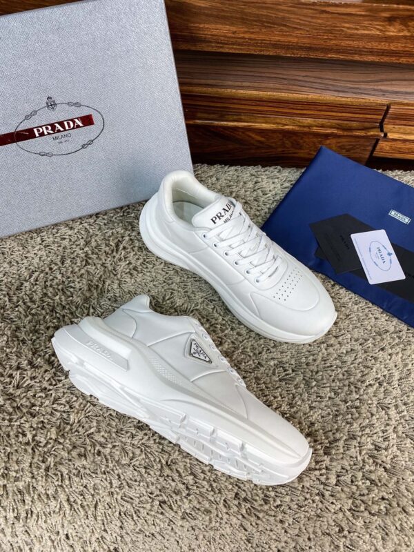 sy_no_20E0A942F8BDD7AF7176394FD51BF0D1_2 Prada White Leather Triangle Logo Thick-Sole Low-Top Sneaker