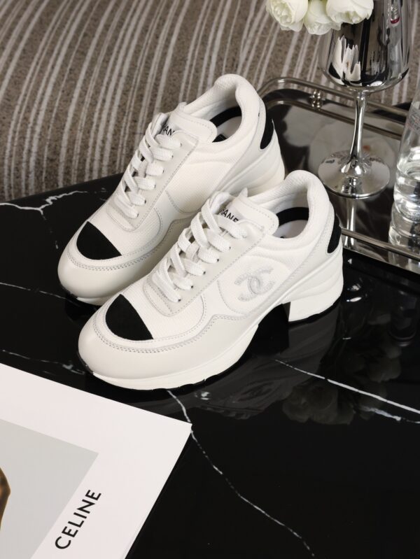 Chanel White and Black Leather Low-Top Sneaker with Cap-Toe and CC Logo