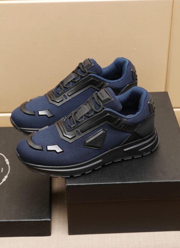 sy_no_27F4AE774F65BB26A23AE6FCA0A14517_0 Prada Navy Mesh Black Trim Triangle Trainer