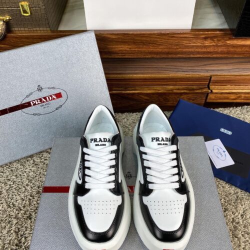 sy_no_29761D92C4463C5AEF6CCCC62AC1A563_0 Prada White Black Triangle Logo Chunky Court Sneaker