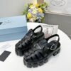 sy_no_2E421CEF8F068595925F6800E09AA7E1_1 Prada Black Rubber Weave Triangle Tread Platform Sandal