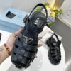 sy_no_2E421CEF8F068595925F6800E09AA7E1_3 Prada Black Rubber Weave Triangle Tread Platform Sandal