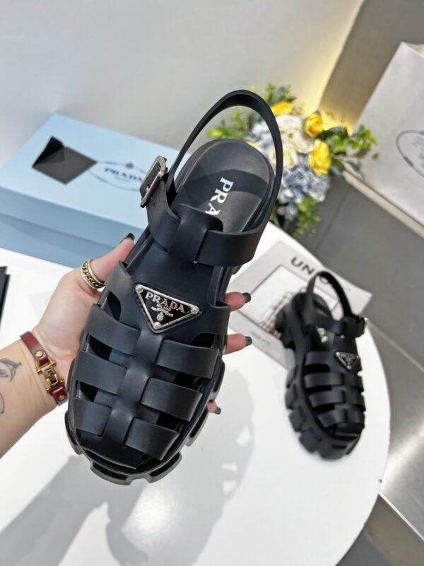 sy_no_2E421CEF8F068595925F6800E09AA7E1_3 Prada Black Rubber Weave Triangle Tread Platform Sandal
