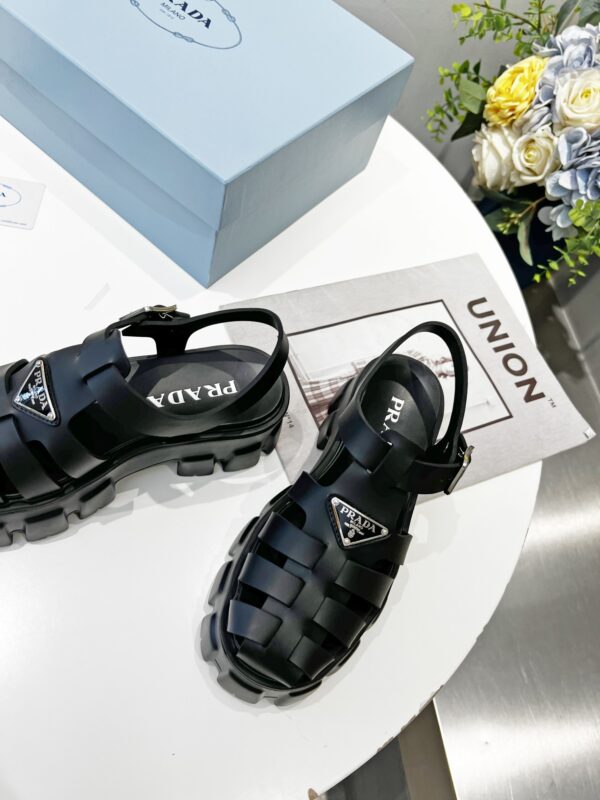 sy_no_2E421CEF8F068595925F6800E09AA7E1_5 Prada Black Rubber Weave Triangle Tread Platform Sandal