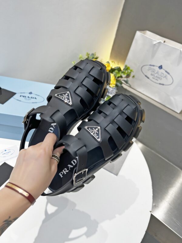 sy_no_2E421CEF8F068595925F6800E09AA7E1_6 Prada Black Rubber Weave Triangle Tread Platform Sandal