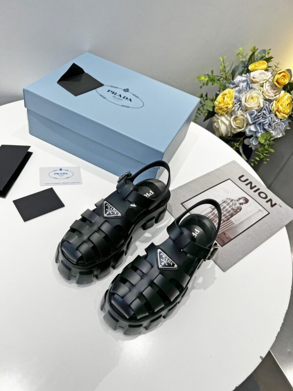 sy_no_2E421CEF8F068595925F6800E09AA7E1_8 Prada Black Rubber Weave Triangle Tread Platform Sandal