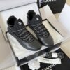 sy_no_301C920624F03E29F93F7AC768B3CE56_0 Chanel Black Leather and Knit Slip-On Low-Top Sneaker with Speckled Laces and CC Logo