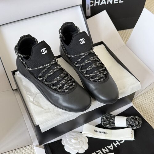 Chanel Black Leather and Knit Slip-On Low-Top Sneaker with Speckled Laces and CC Logo