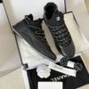 sy_no_301C920624F03E29F93F7AC768B3CE56_1 Chanel Black Leather and Knit Slip-On Low-Top Sneaker with Speckled Laces and CC Logo
