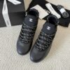 sy_no_301C920624F03E29F93F7AC768B3CE56_2 Chanel Black Leather and Knit Slip-On Low-Top Sneaker with Speckled Laces and CC Logo
